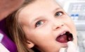 儿童的牙龈反复长脓疱的原因及根治方法